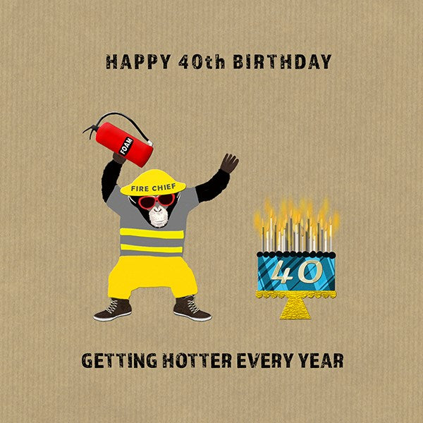 A chimpanzee dressed as a fireman holding a fire extinguisher and a 40th Birthday cake with 40 lit candles.