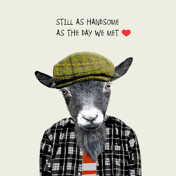 Goat dressed in a flat cap wearing a checked shirt