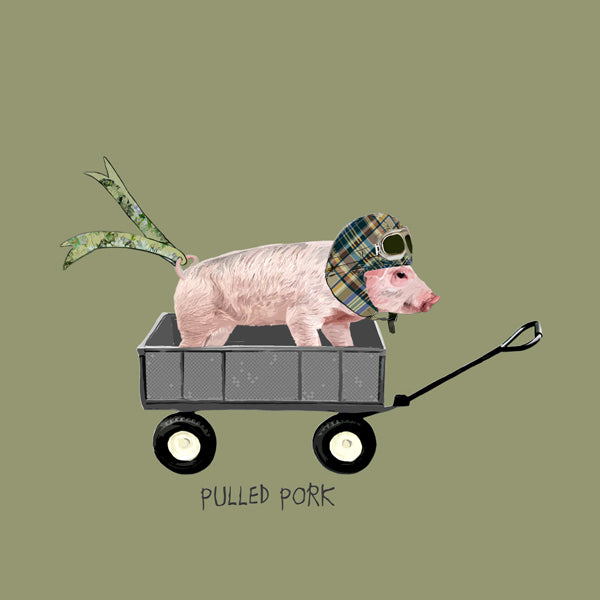 A pig dressed in driving hat and goggles, being pulled along in a trailer.